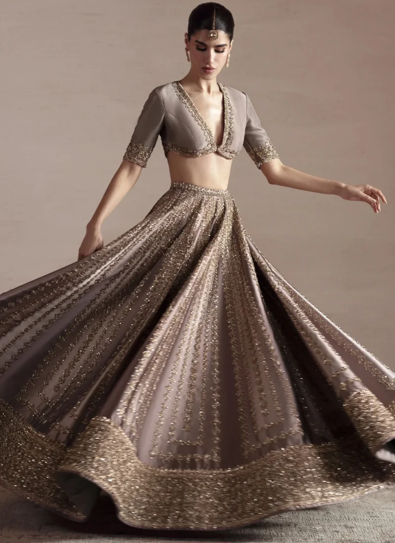 Gray Baraat Bridal Lehenga Choli with Gold Zari Embroidery – Front View Gray Baraat Lehenga Choli with Criss-Cross Keyhole Back Video