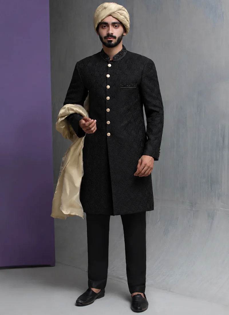 Traditional-Black-Wedding-Sherwani-with-Gold-Shawl.webp Traditional Black Wedding Sherwani with Gold Shawl