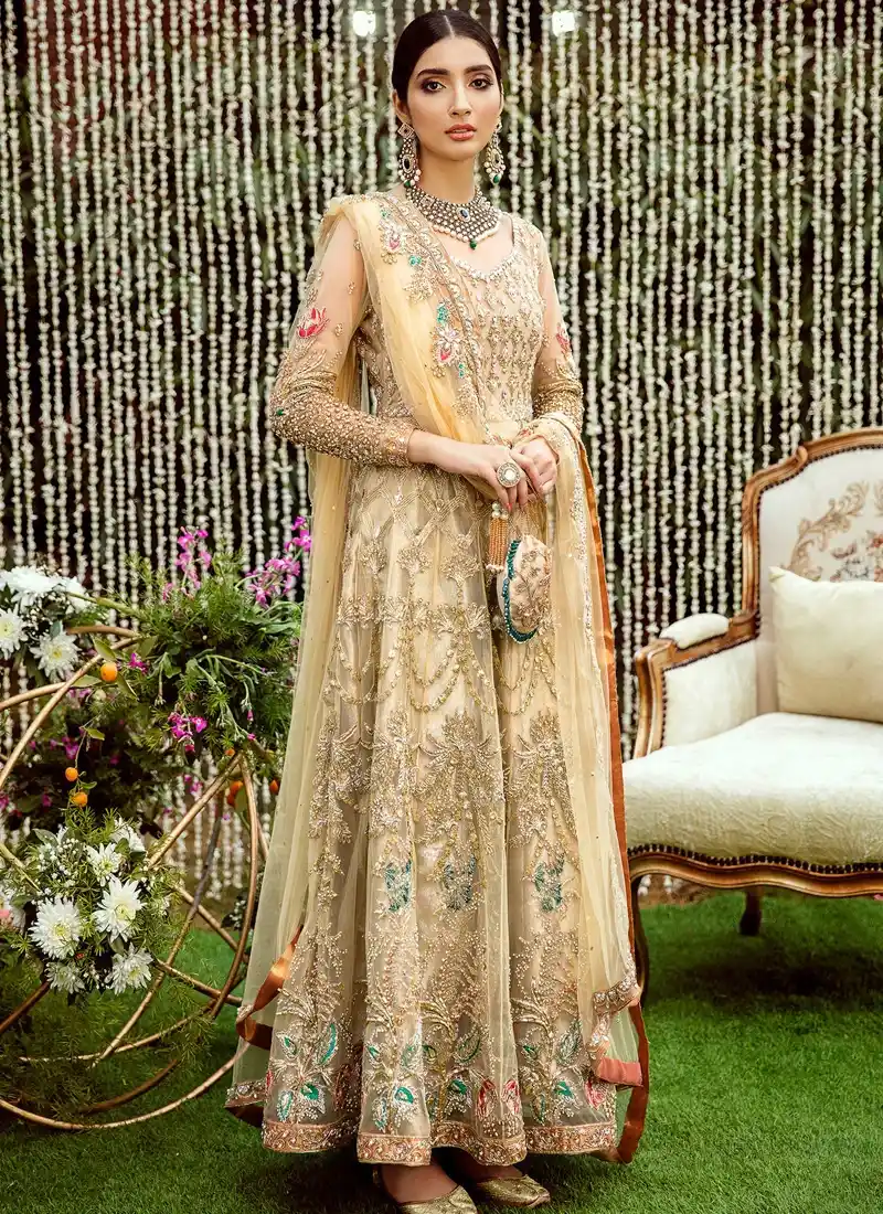 Champagne Walima Gown with Draped Garland Embroidery Champagne gold bridal pishwas front close-up with floral embroidery and a sheer bordered dupatta