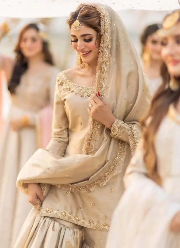 gold nikkah gharara suit with kiran lace dupatta border 02 Gold Nikkah Gharara Suit with Kiran-Lace Dupatta Border Video