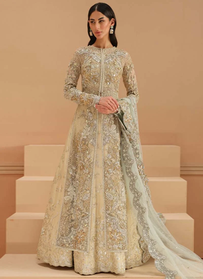 Ivory Reception Long Shirt with Lehenga with Starburst Floral Panels Ivory long shirt close-up with pearl-edged round neckline and gold starburst floral embroidery