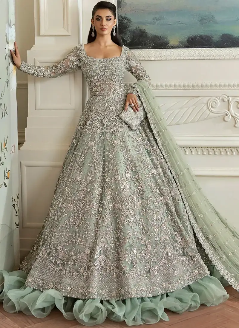 Sage Green Nikkah Maxi with Spiral Hem Frills Sage green Nikkah bridal maxi in angled front view with silver floral embroidery and spiral hem frills