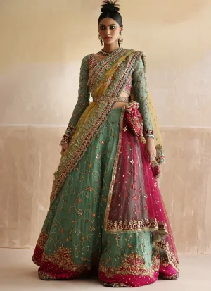 Sea green mehndi lehenga choli front view with gold vine embroidery, hot pink floral hem and yellow dupatta