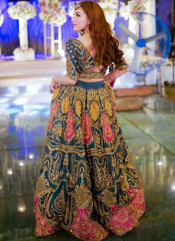 zinc blue mehndi lehenga choli with fuchsia paisley motifs 02 Zinc Blue Mehndi Lehenga Choli with Fuchsia Paisley Motifs Video